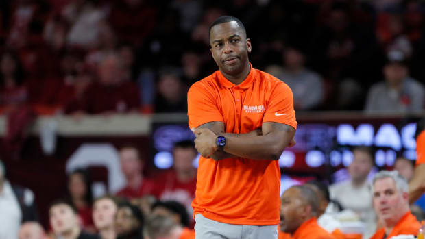 Oklahoma State coach Mike Boynton watches his team during a Bedlam college basketball game between the University of Oklahoma Sooners (OU) and the Oklahoma State Cowboys (OSU) at Lloyd Noble Center in Norman, Okla., Saturday, Feb. 10, 2024. Oklahoma won 66-62.  